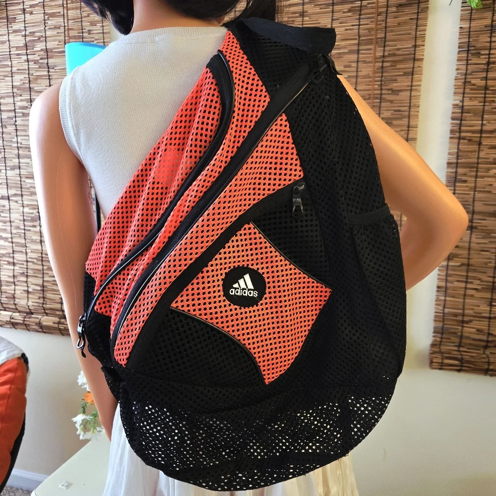adidas backpack orange black Pro Tour Blue 2026 this backpack from the Adidas 2023 collection integrates a spacious main compartment that has a capacity to hold up to 3 padel racquets adidas Black & Orange Mesh